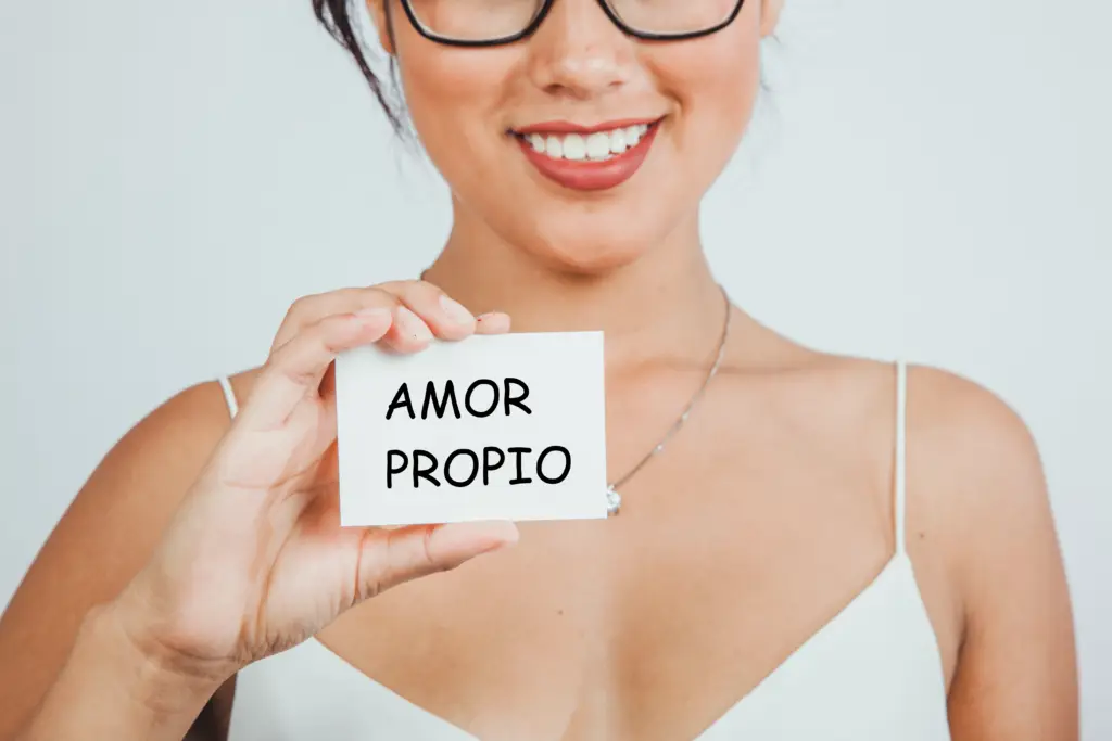 smiley-businesswoman-showing-business-card