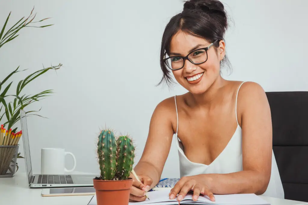 smiley-young-woman-posing-office